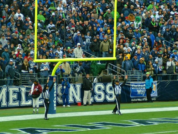 The referees signal a field goal (or extra point) good by raising both arms The referees signal a field goal (or extra point) good by raising both arms